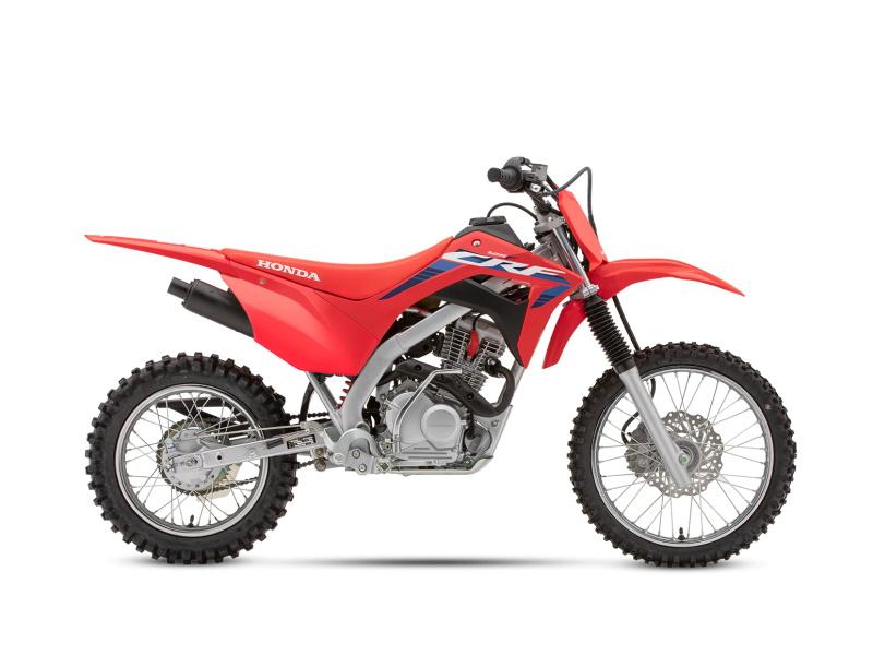 A red 2023 Honda® Motorcycle Dirt BIke. 